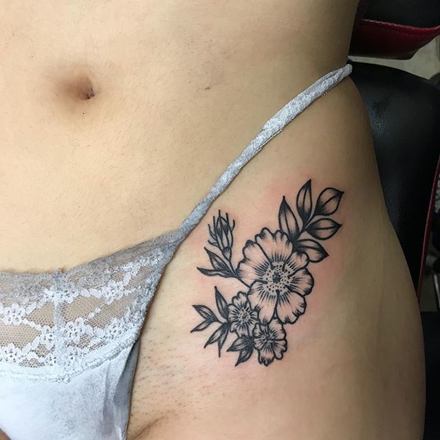 flower tattoo groin