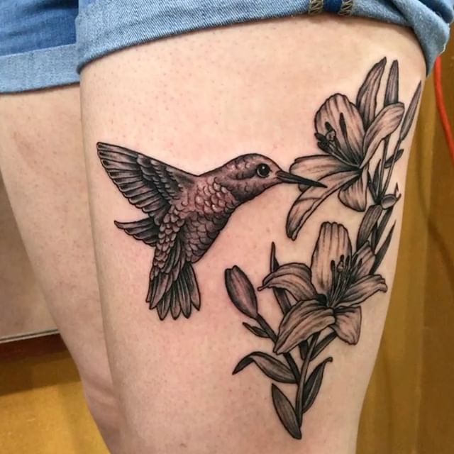 Flower and hummingbird tattoo  Floral thigh tattoos Thigh tattoos women  Tattoos