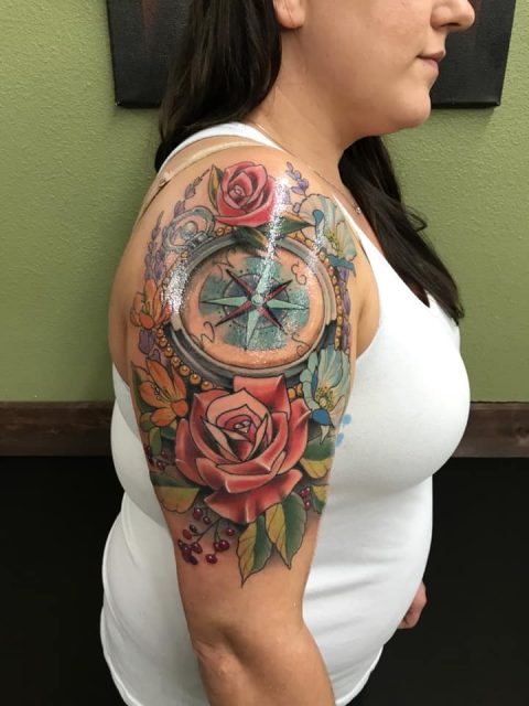 Feminine Compass Tattoo with Floral Design