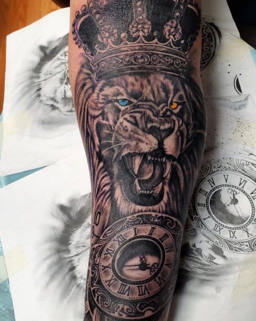 lioness tattoo with crown