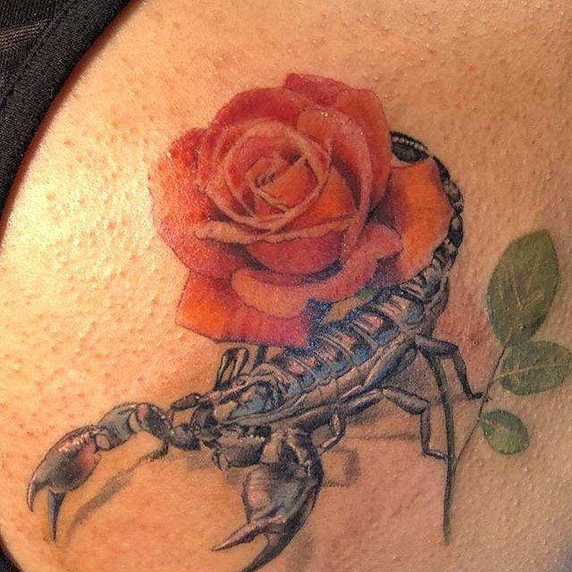 KevKapo  added this scorpion and clock to a rose i had  Facebook