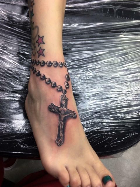 Realistic Black Rosary Tattoo On Foot And Ankle