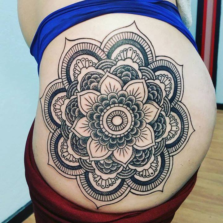 Perfectly executed butt mandala from Want one too Get in touch     Studio XIII Gallery