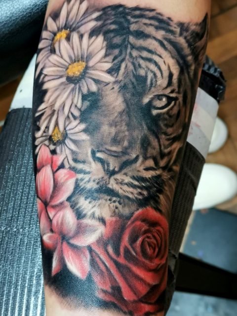 female tiger tattoo